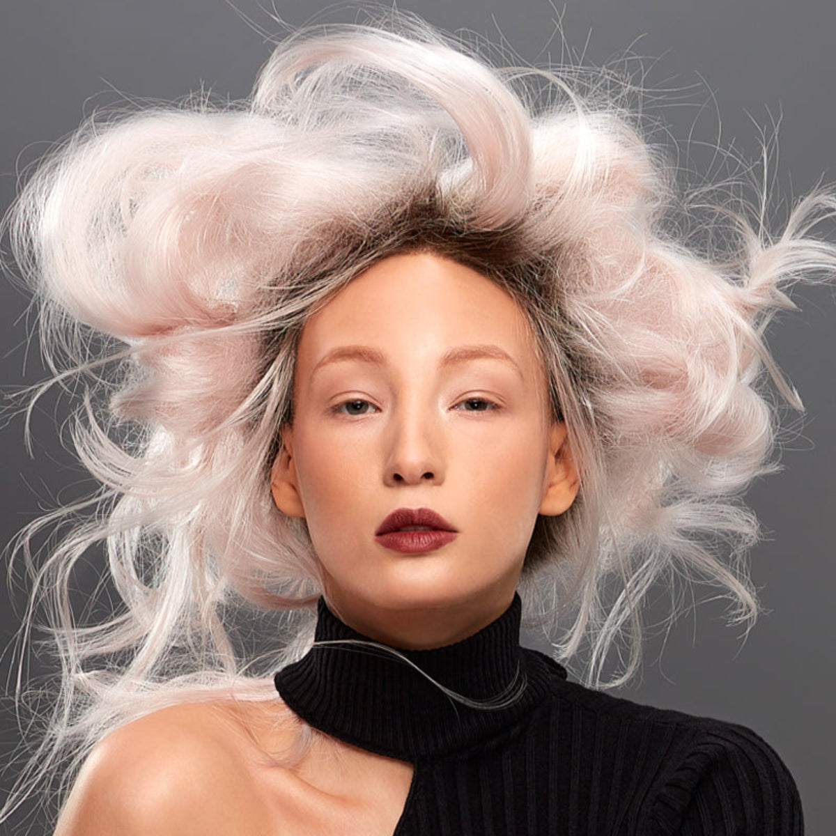 Zara wig by Jon Renau in the colour Frost in an updo style.