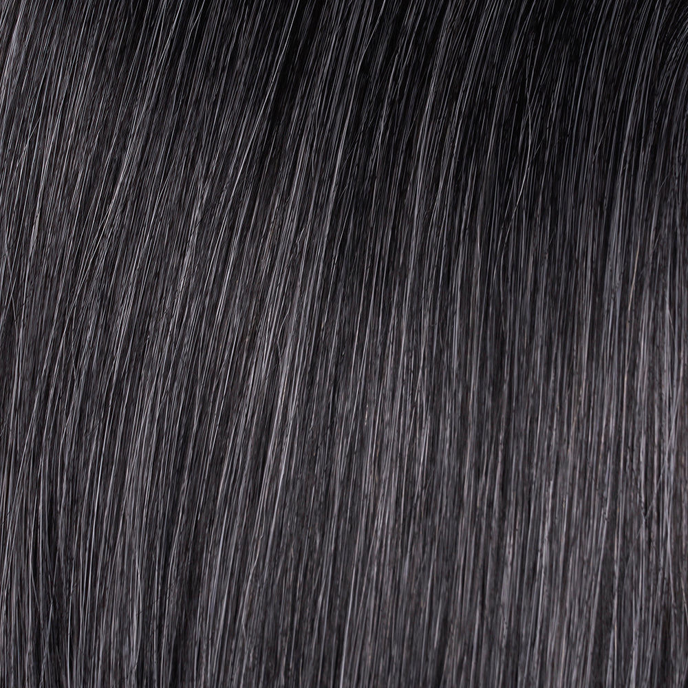 Close-up of dark brown hair texture