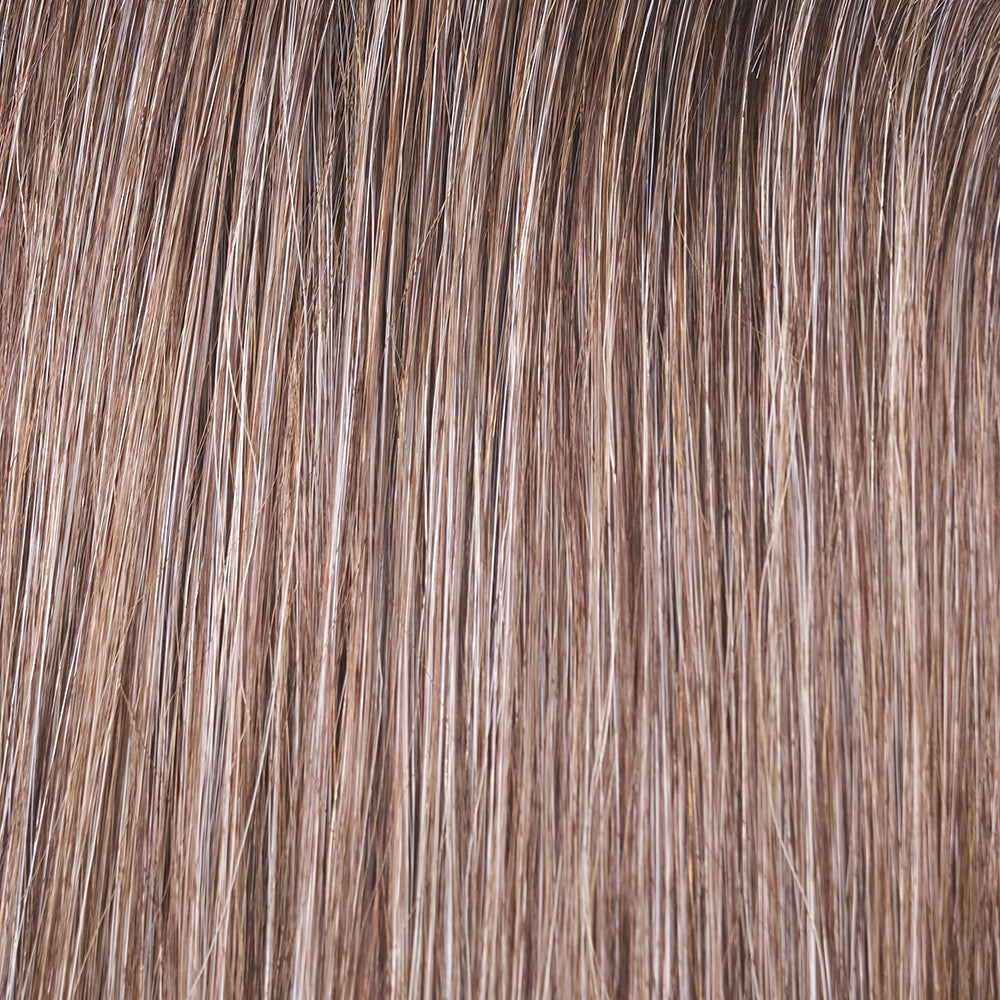 Close-up of brown hair strands with a focus on texture and color.