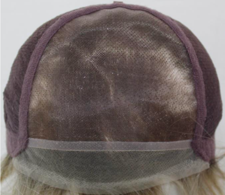 Close-up of a wig cap with mesh and purple band on a white background
