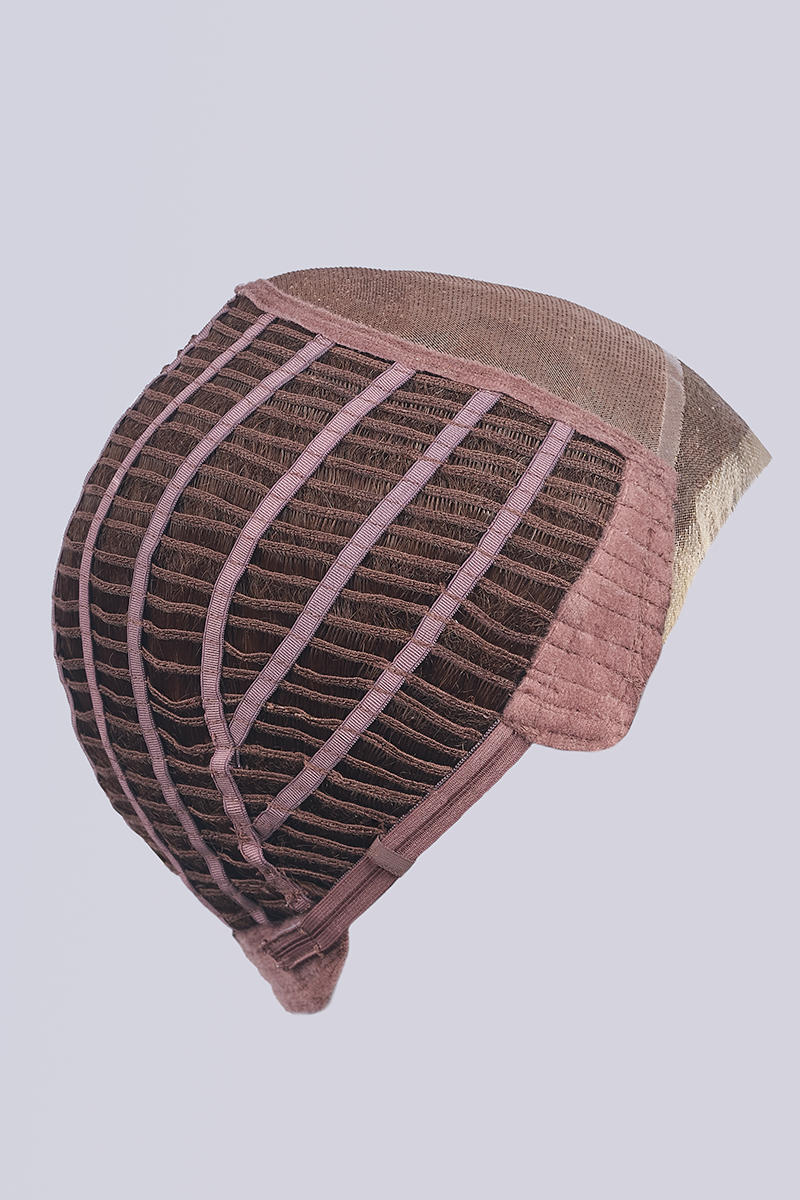 Knitted beanie with a grid pattern on a light gray background