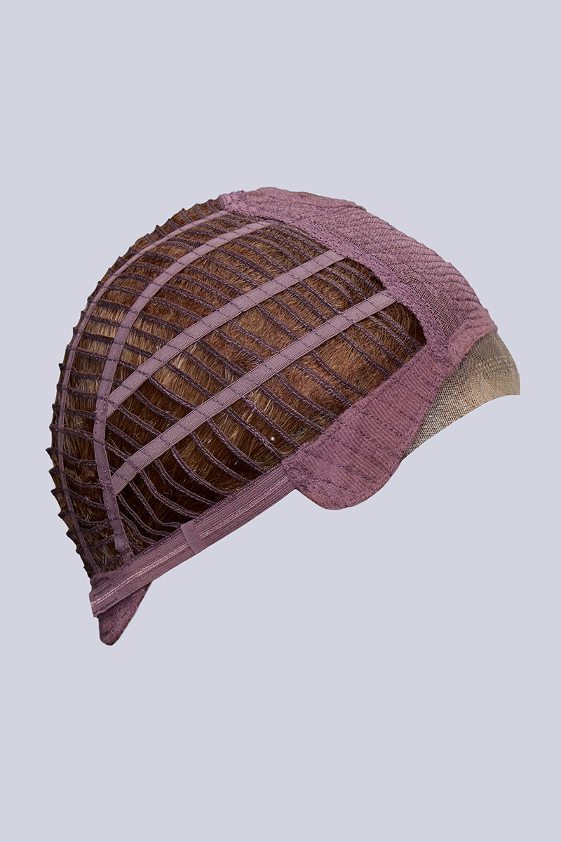 Textured knit cap with a ribbed pattern on a light gray background