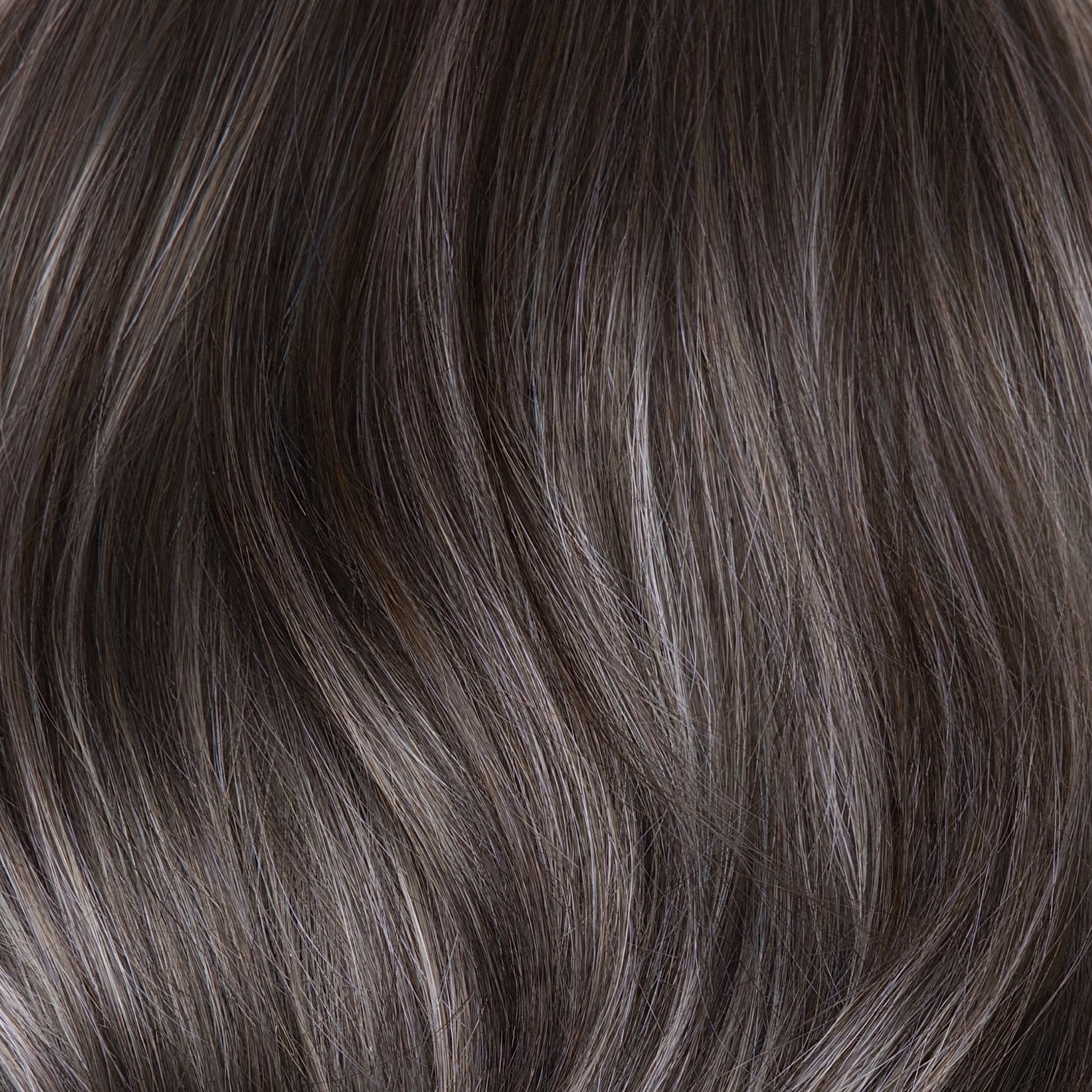 Close-up of dark brown hair with subtle highlights