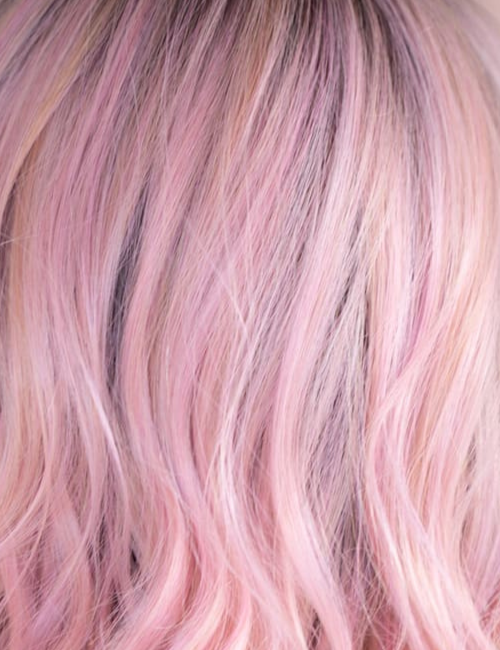 Close-up of pink hair with a gradient effect