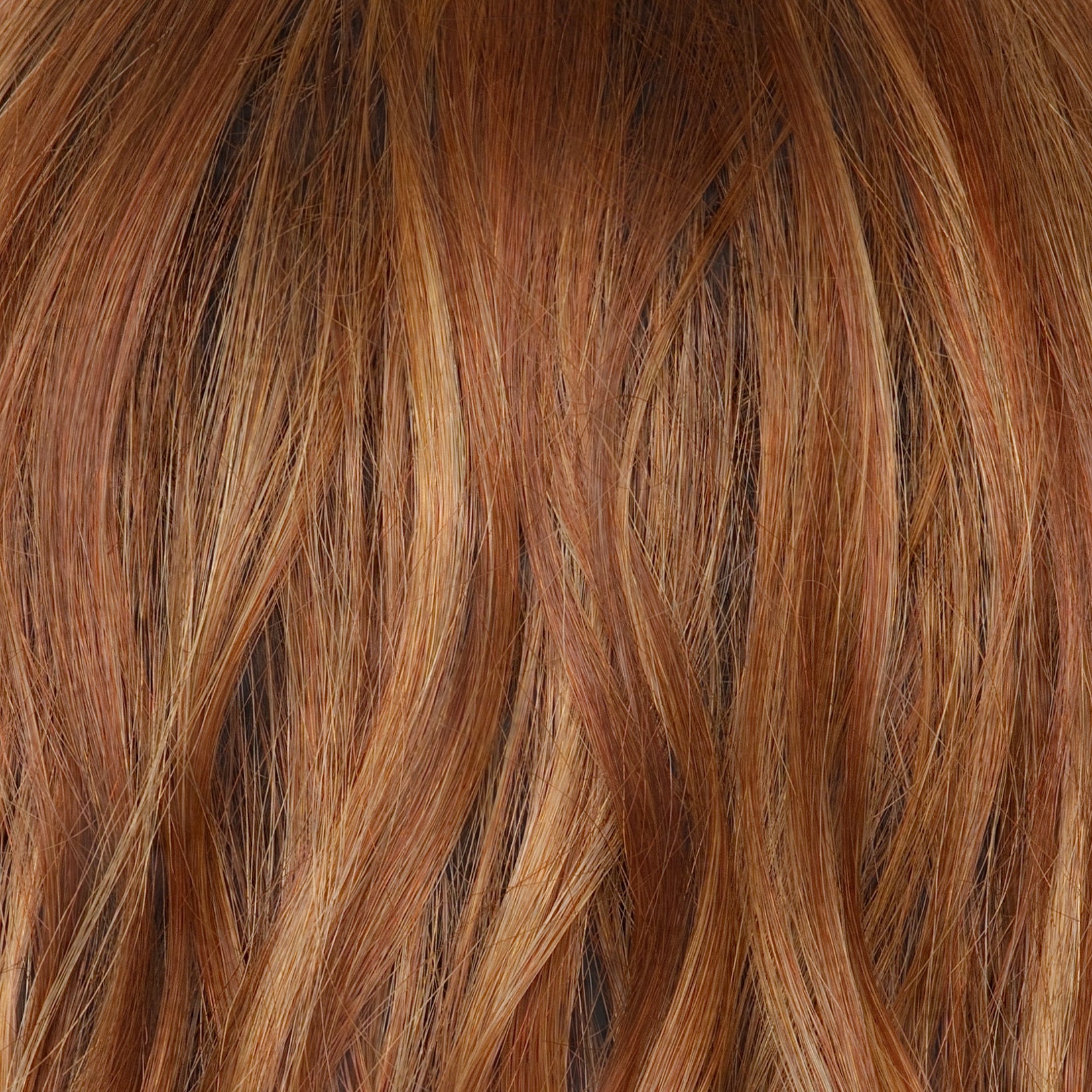 Close-up of brown hair with highlights