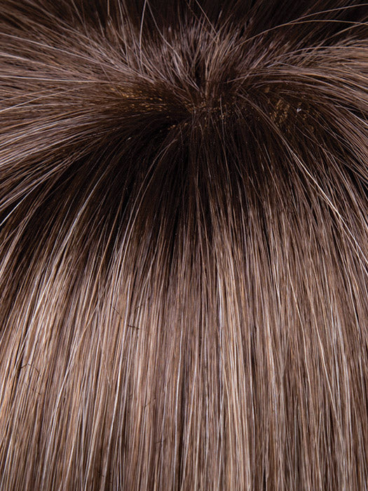 Close-up of brown hair with a focus on texture and color.