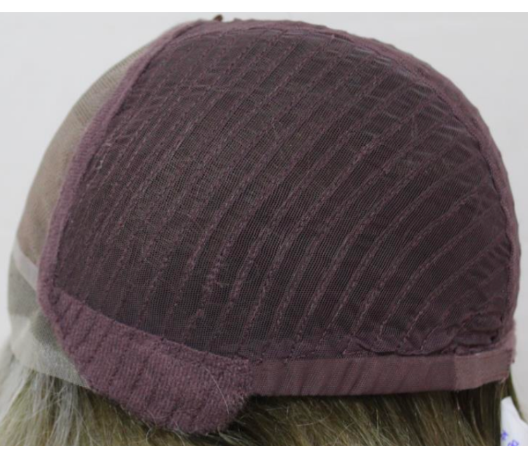 Close-up of a textured purple headband worn by a person with light brown hair on a white background.