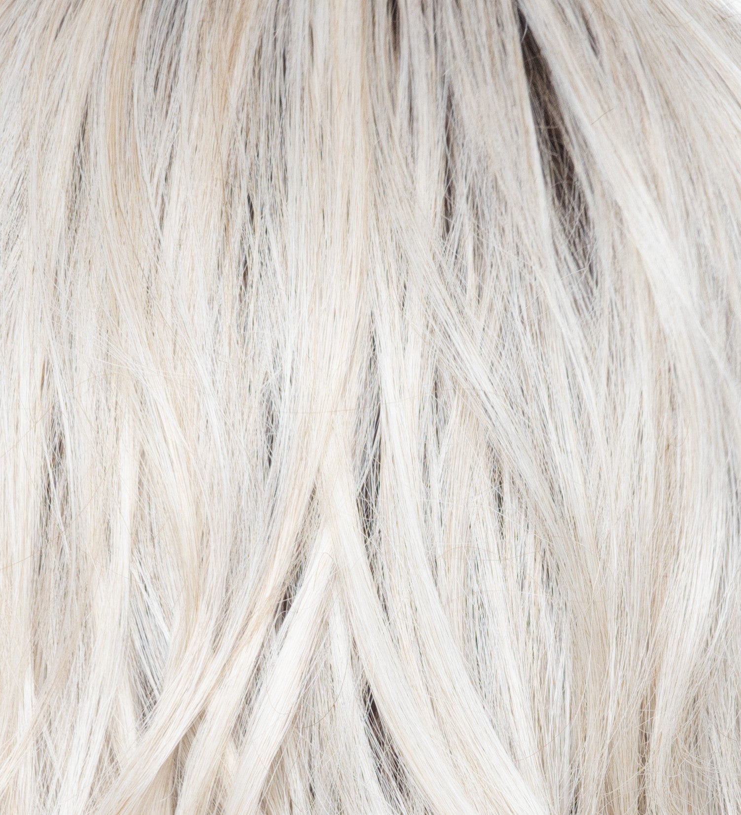 Close-up of blonde hair with a gradient from light to dark.